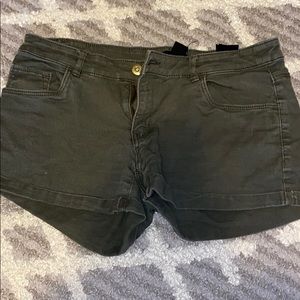 green denim shorts